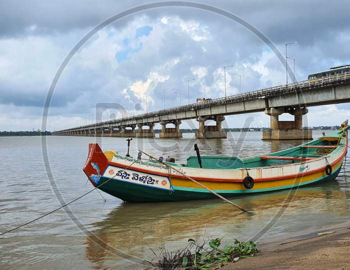 Fishing vessel anchored on the banks of Godavari river in Yanam                     river in Yanam