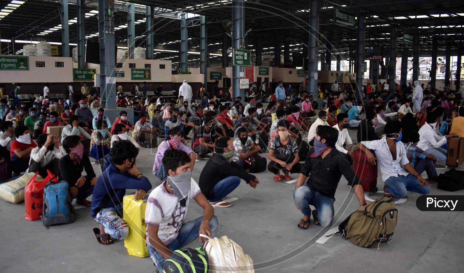 Migrant Laborers Rest After Arriving From Gujarat State On A Special Train At Prayagraj Railway Station During Nationwide Lockdown Amidst Coronavirus Or Covid- 19 Pandemic, Prayagraj, May 10, 2020