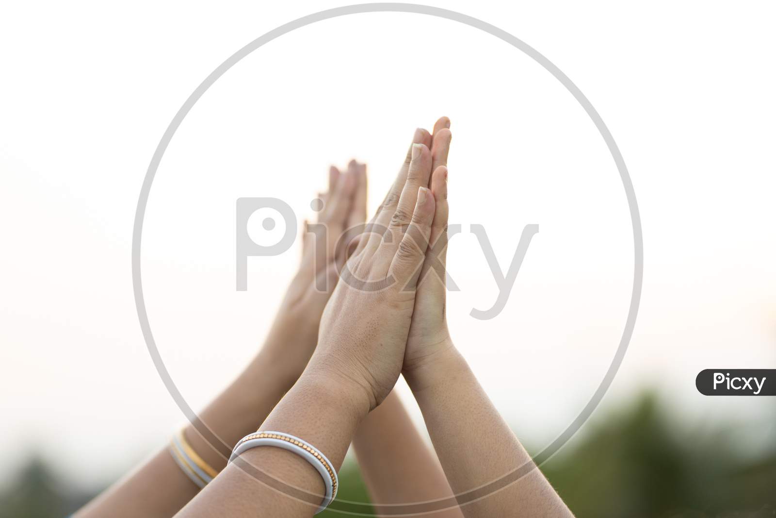 Child And Mother Hand Making High Five