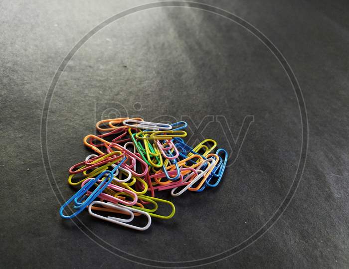 Paperclip on black background.