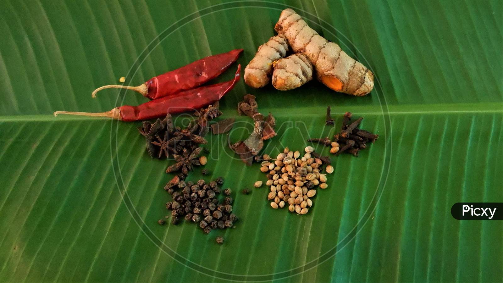 indian kerala masala spices on banana leaf