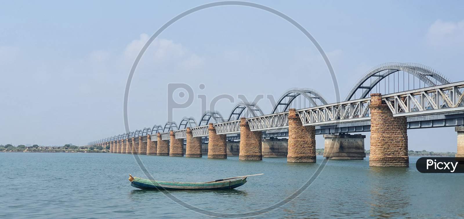 Wide view of railway bridges across the Godavari river