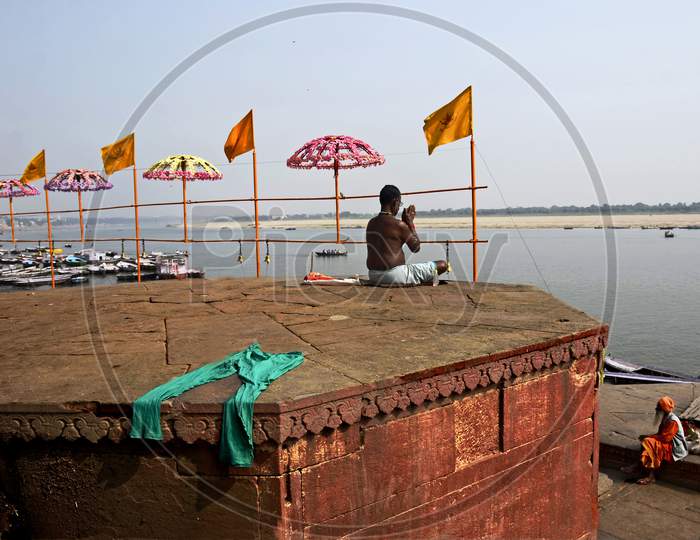 devotee at varanasi ghat