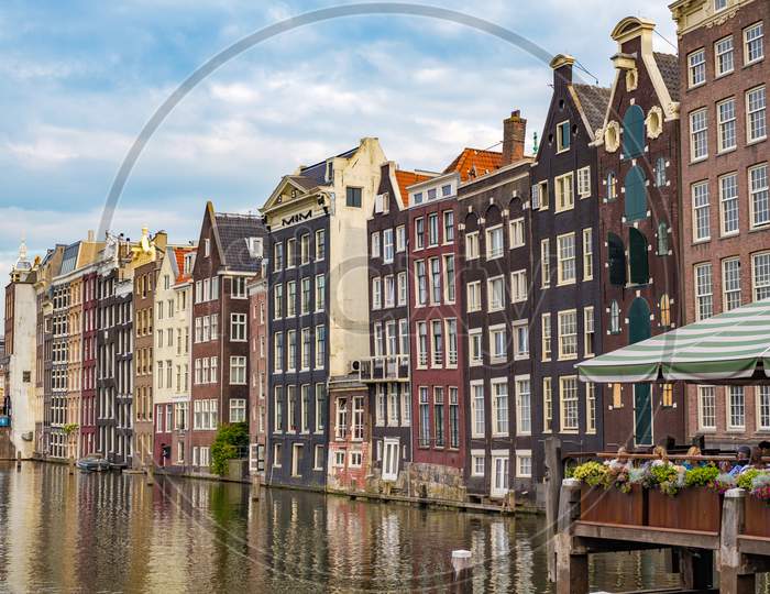 Amsterdam, Capital Of The Netherlands, With Its Iconic Canals And Colorful Old Facades