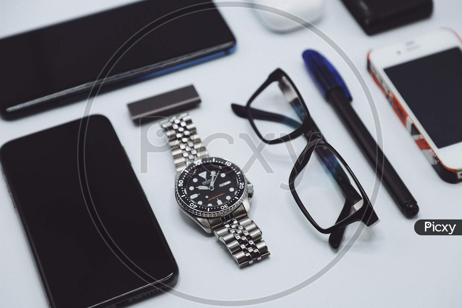 modern photography equipment over white table background