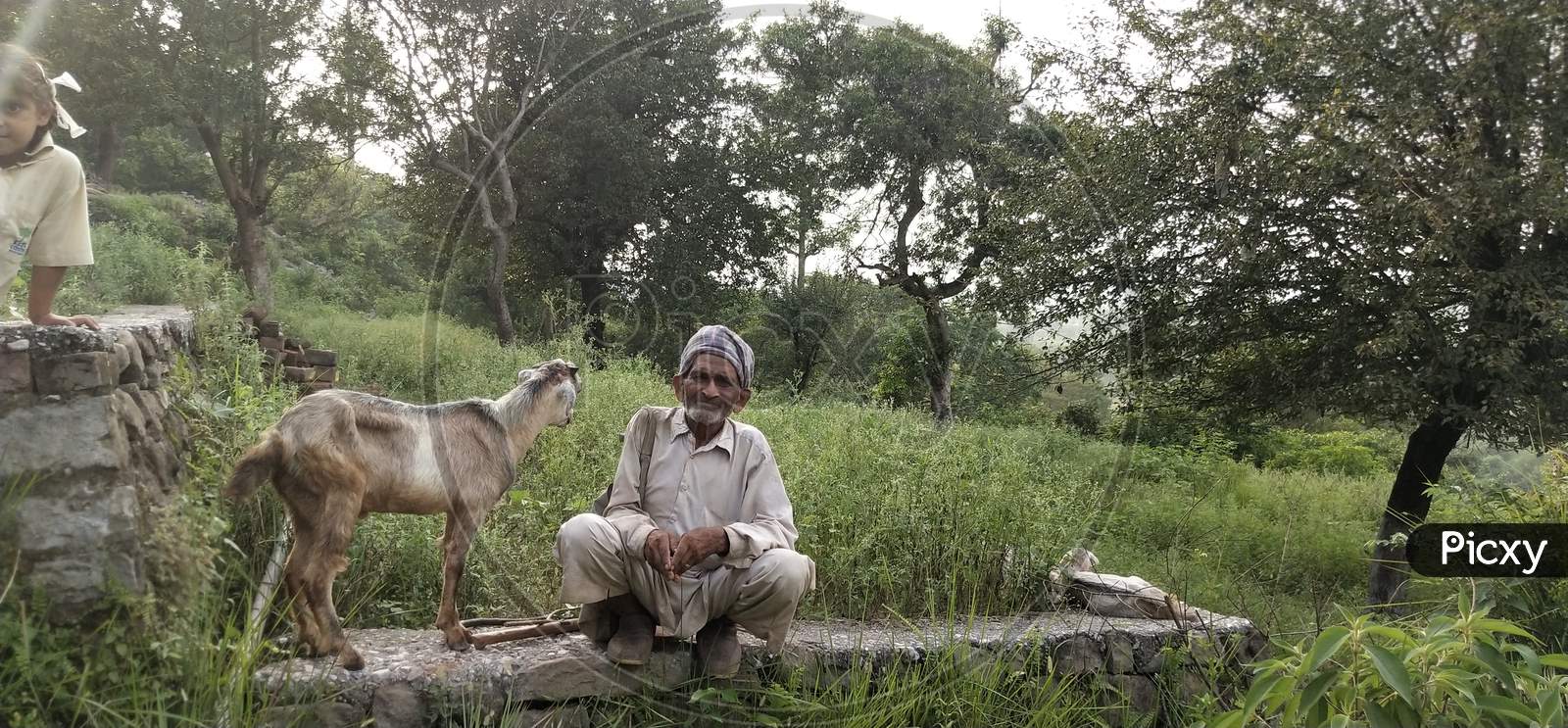 Old man with goat