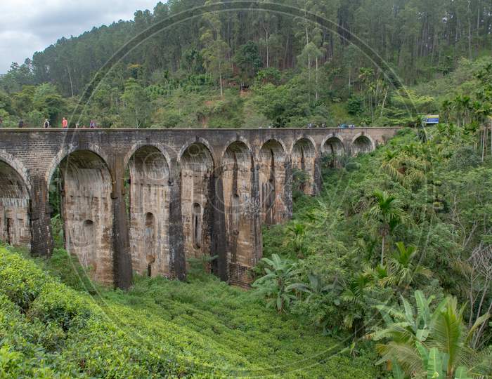 Ella / Sri Lanka - November 18 2020 : The Unspecific People Had Taking Photo With Moving Train. The Train Was Moving Through The Nine Arches Bridge At The Ella, Sri Lanka. Here'S One Of The Famous Place.