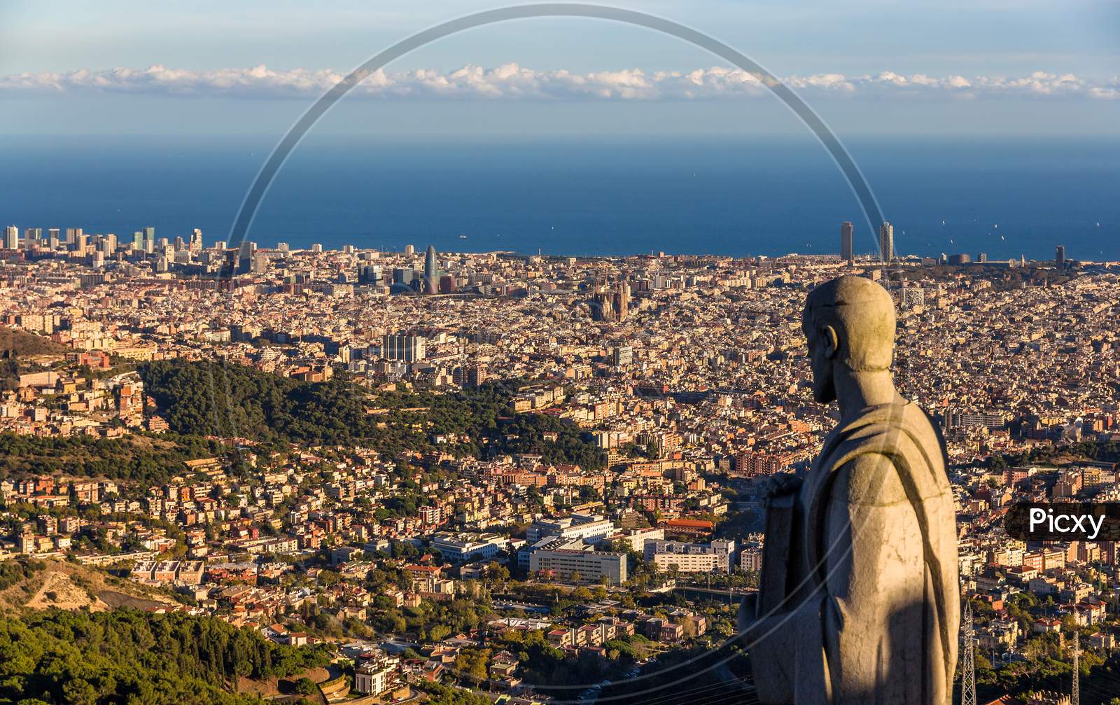 Sculpture Of Apostle And View Of Barcelona