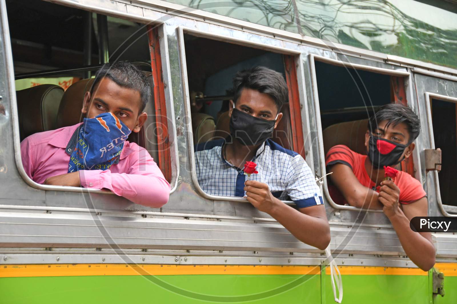 Migrant workers stranded due to lockdown in Novel Coronavirus (COVID-19) situation are going to their homes in the state of Assam from Burdwan on a private initiative.