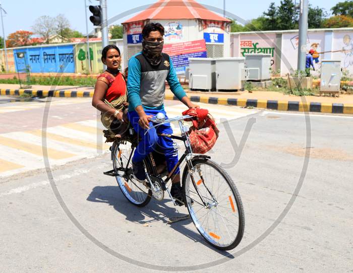 Migrant Workers Travelling on Bicycle To Their Native Place During Nationwide Lockdown Amidst Coronavirus Or COVID-19 Pandemic  In Prayagraj, May 12, 2020