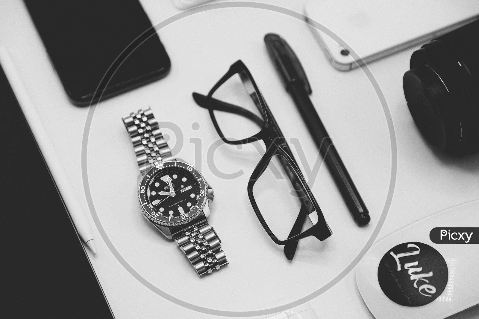 modern photography equipment over white table background