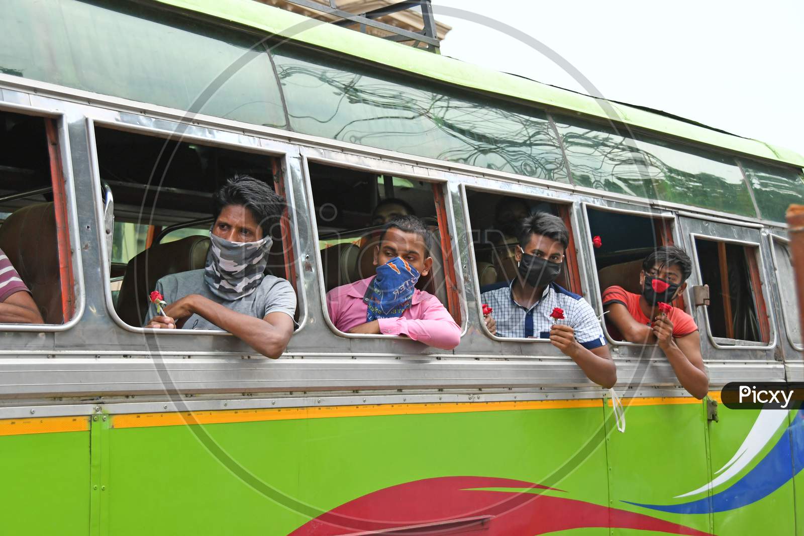 Migrant workers stranded due to lockdown in Novel Coronavirus (COVID-19) situation are going to their homes in the state of Assam from Burdwan on a private initiative.