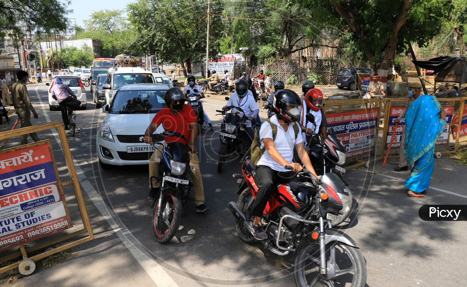 People Drive Through Barricades At City Entrance Points As They Enter The Prayagraj City During Nationwide Lockdown Amidst Coronavirus Or Covid-19 Pandemic In Prayagraj, May 12, 2020