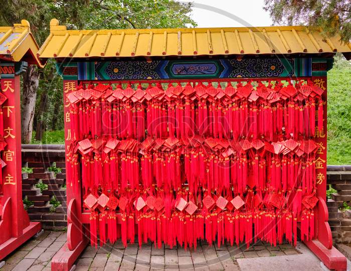 Red Wooden Prayer Tablets At The Temple And Cemetery Of Confucius, Unesco World Heritage Site In Qufu, China. Chinese Buddhism And Confucianism