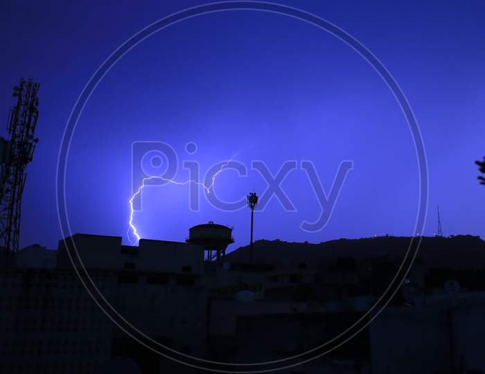 Lightning flashing through the sky over the Ajmer city during unseasonal rain in Ajmer, Rajasthan, India on 06 May 2020.