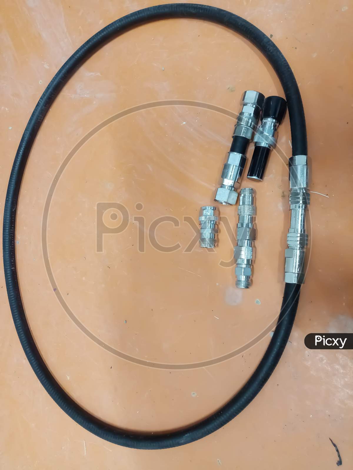 A networking cable with nuts and bolts