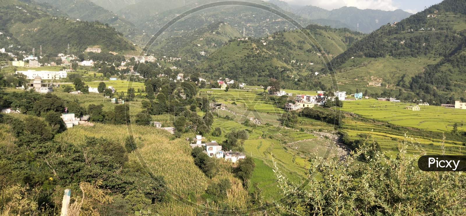 Village landscape with mountains