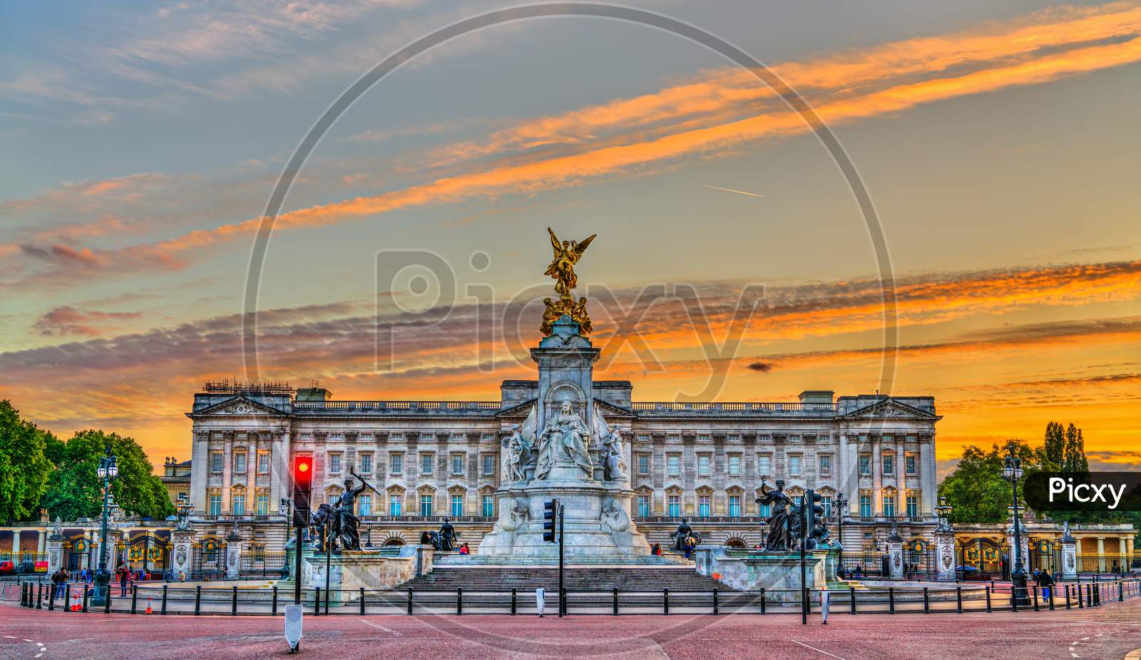 The Victoria Memorial And Buckingham Palace In London, England