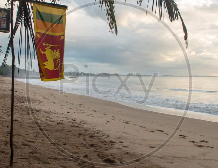 Tangalle, Sri Lanka : 2020 Nov 25 : Flag Of  In The Sunset In The Beach Of Tangalle, Sri Lanka.
