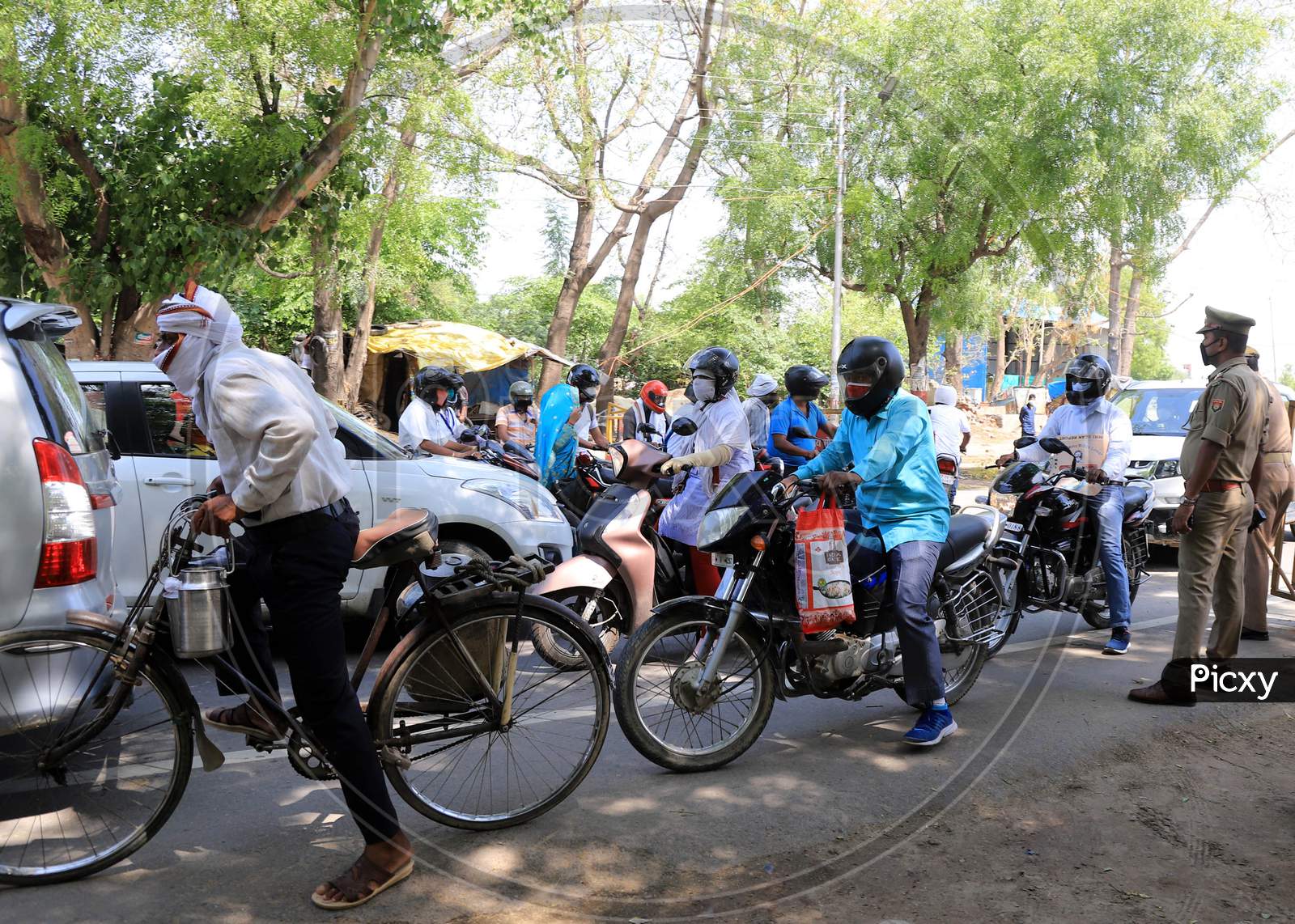 People Drive Through Barricades At City Entrance Points As They Enter The Prayagraj City During Nationwide Lockdown Amidst Coronavirus Or Covid-19 Pandemic  In Prayagraj, May 12, 2020