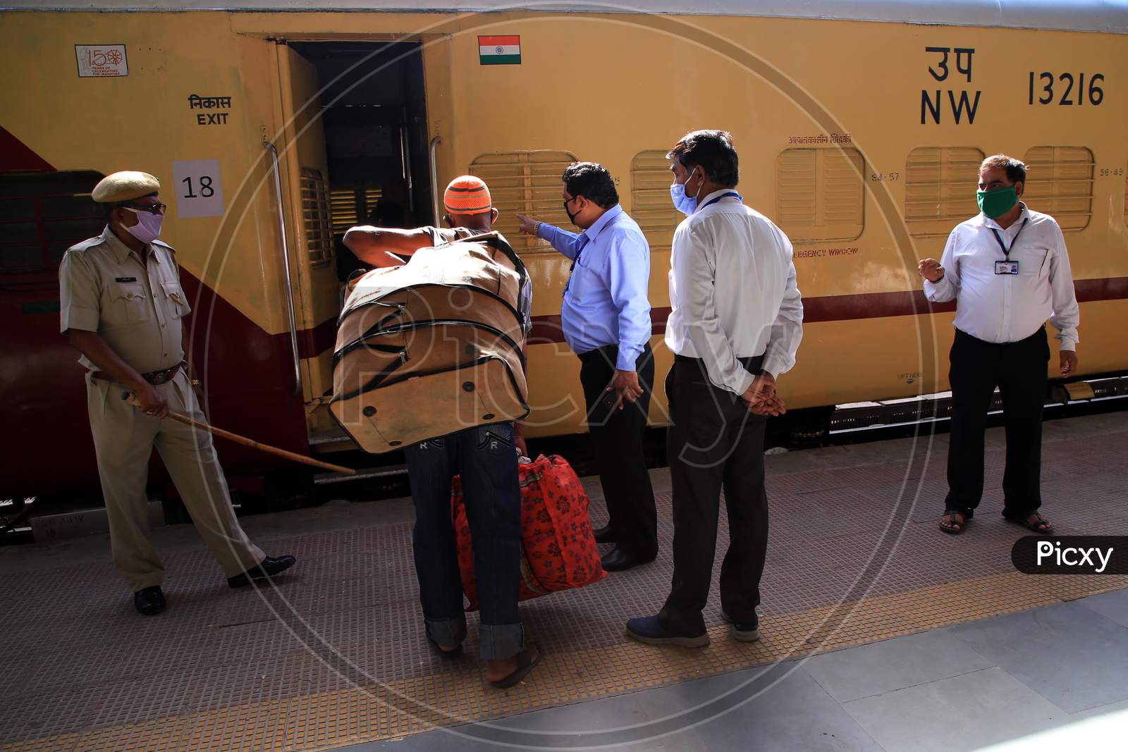 Stranded People Queue To Board On A Special Train Going To West Bengal State During A Government-Imposed Nationwide Lockdown As A Preventive Measure Against The Covid-19 Coronavirus, In Ajmer On May 4, 2020.