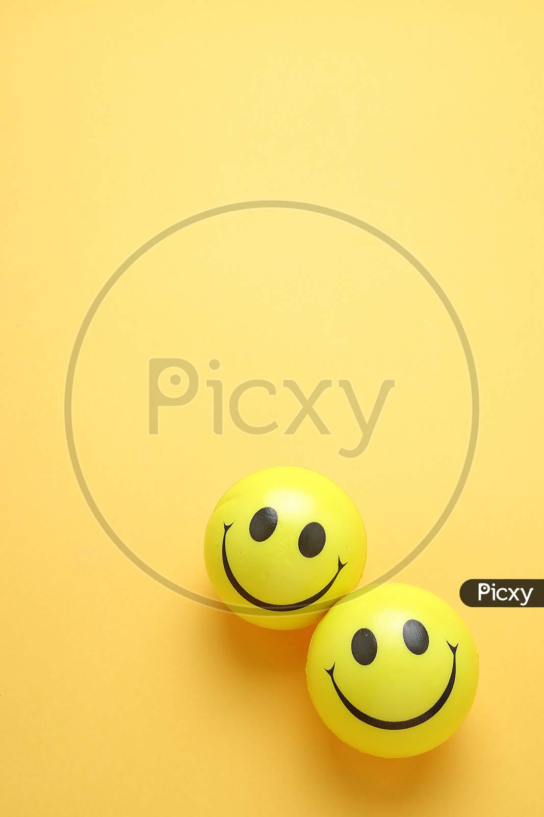 Smile Yellow Balloon.Toy Ball On Yellowbackground. Smile Icons. Emoji. Emoticons .Top View Flat Lay Copy Space