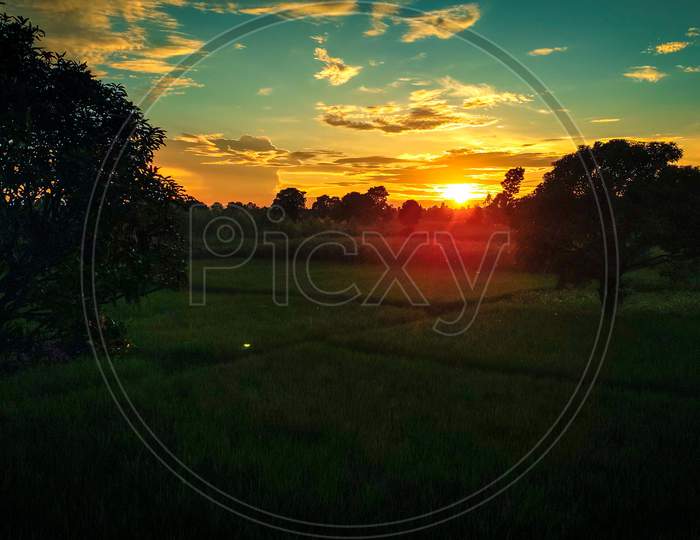 Scenic view of village sunset