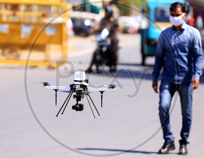 A drone operated by a security personnel for surveilling a hotspot area during a government-imposed nationwide lockdown as a preventive measure against the COVID-19 or coronavirus, in Ajmer, Rajasthan, India on 06 May 2020.