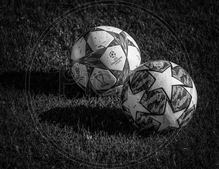 Two football  on the ground Black and white view