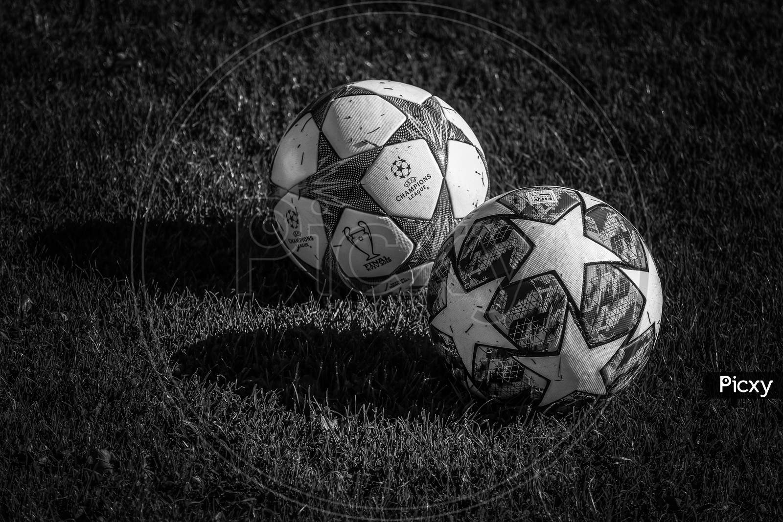 Two football  on the ground Black and white view