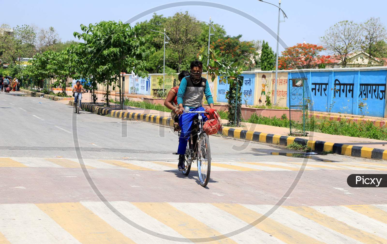 Migrant Workers Travelling on Bicycle To Their Native Place During Nationwide Lockdown Amidst Coronavirus Or COVID-19 Pandemic  In Prayagraj, May 12, 2020