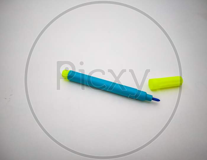 Blue Sketch Pen Isolated With White Background.
