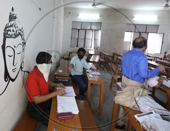 Teachers Marking Uttar Pradesh Board Copies During Nationwide Lockdown Amidst Coronavirus Or COVID-19 Pandemic  In Prayagraj, May 12, 2020