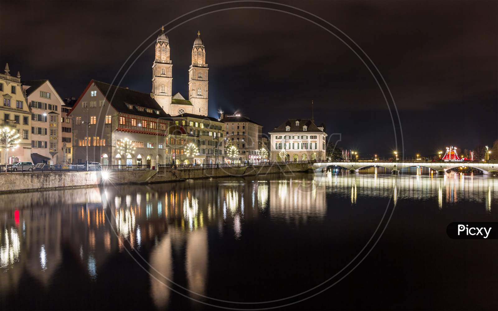 Zurich On Banks Of Limmat River At Winter Evening
