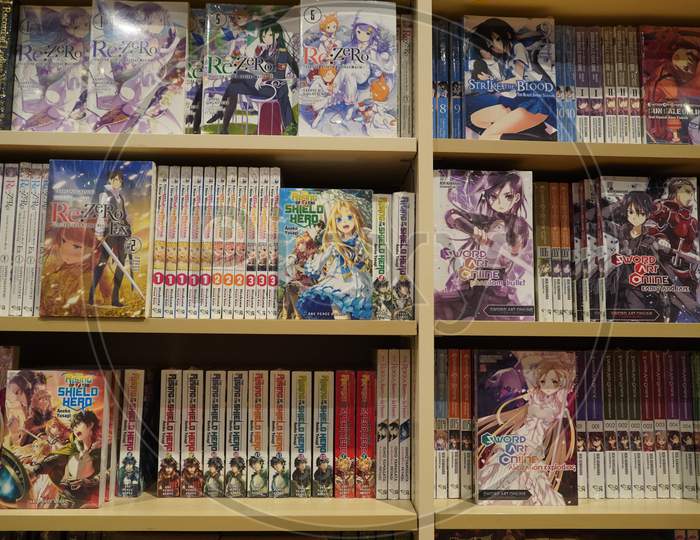 Various Japanese Cartoon Books For Sale In A Bookshop. Anime, Mange. Various Mangas On Display For Sale. Manga Comic Books. Japanese Culture. Japan Comic Magazines. - Dubai Uae December 2019