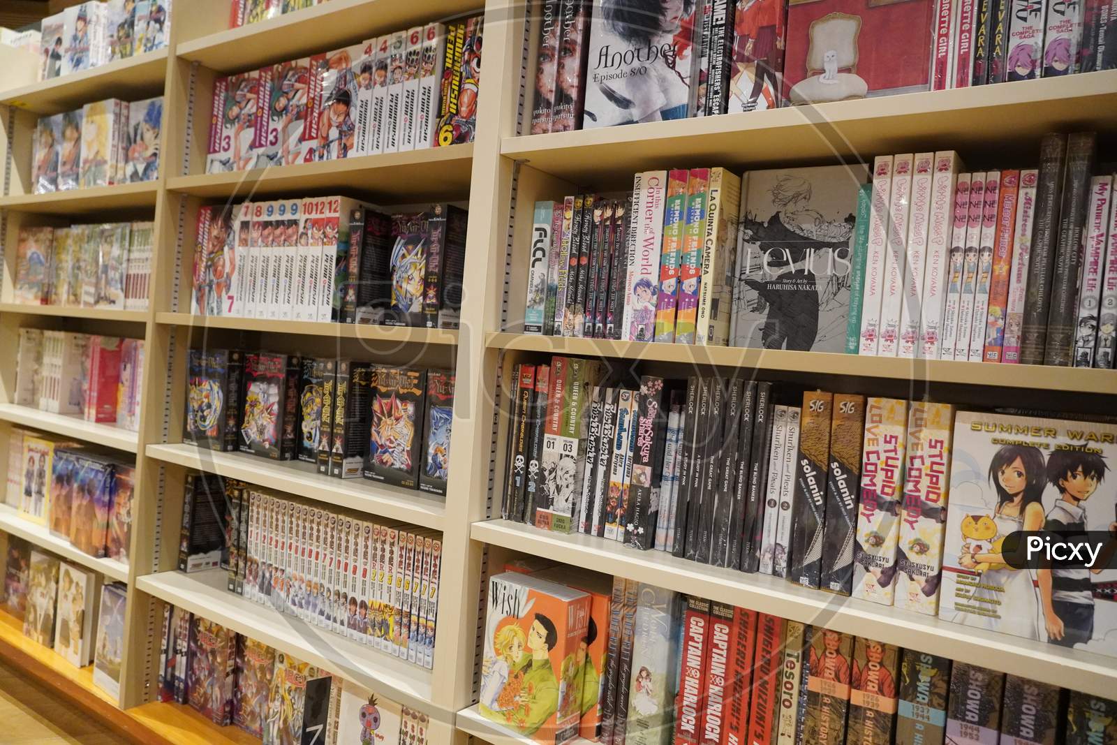 Various Japanese Cartoon Books For Sale In A Bookshop. Anime, Mange. Various Mangas On Display For Sale. Manga Comic Books. Japanese Culture. Japan Comic Magazines. India