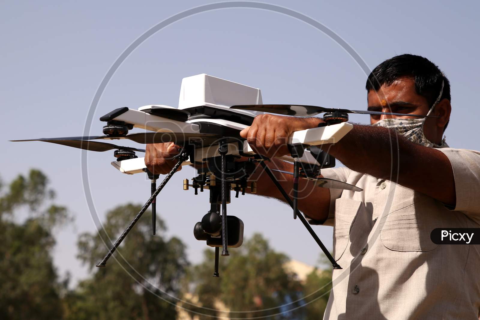 A Police Personnel Prepares To Check A Drone For Surveilling A Hotspot Area During A Government-Imposed Nationwide Lockdown As A Preventive Measure Against The Covid-19 Coronavirus, In Ajmer, Rajasthan, India On 02 May 2020.