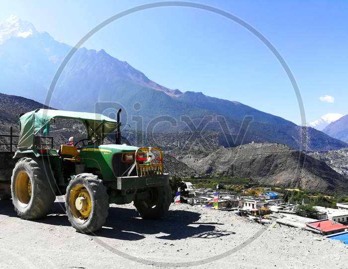 Tractor in the mountains,Amazing View of the tractor on the top of the mountain.