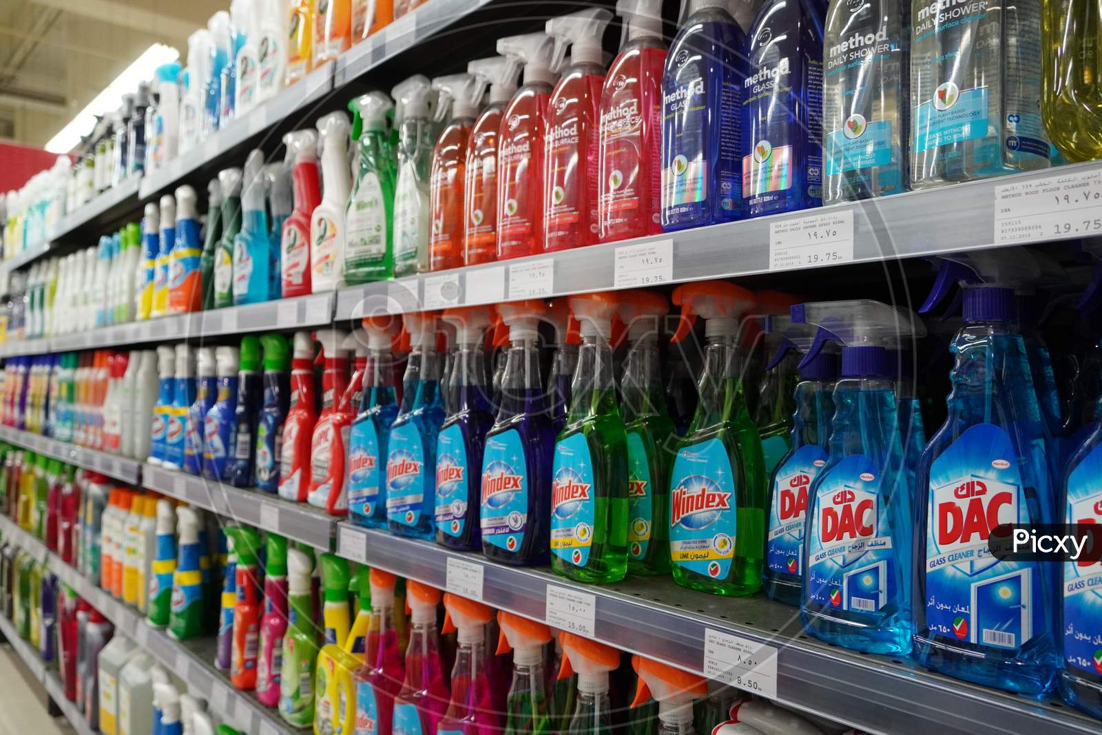 Cleaning Supplies, Sprays, Liquids Cleaning Detergents For Sale On Supermarket Stand. Bottles With Cleaning Products For Cleaning House Of Various Manufacturers On Shelves.