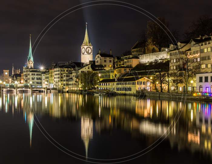 Zurich On Banks Of Limmat River At Winter Night