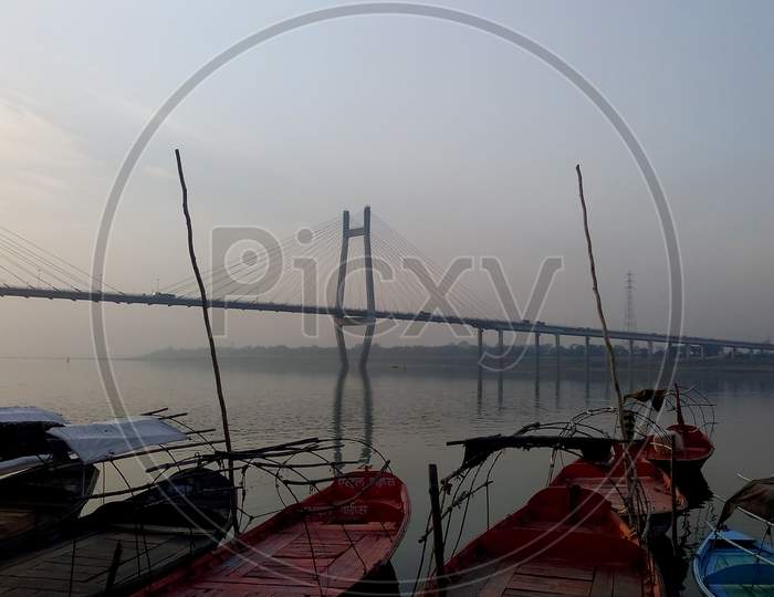 A panoramic view of the Naini Bridge at morning.