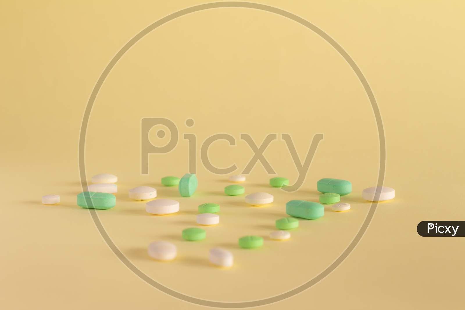 image-of-medicines-on-a-neutral-yellow-background-drugs-for-legal-use