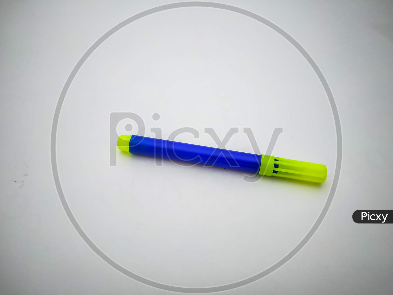 Blue Sketch Pen Isolated With White Background.