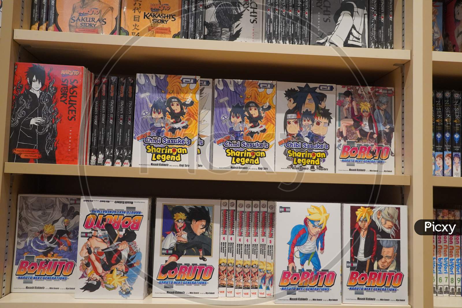 Various Japanese Cartoon Books For Sale In A Bookshop. Anime, Mange. Various Mangas On Display For Sale. Manga Comic Books. Japanese Culture. Japan Comic Magazines.