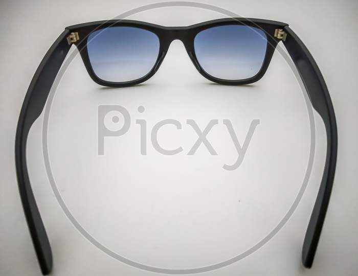 Wayfarer Sunglasses With Black Frame And Navy Blue Glass Isolated With White Background.