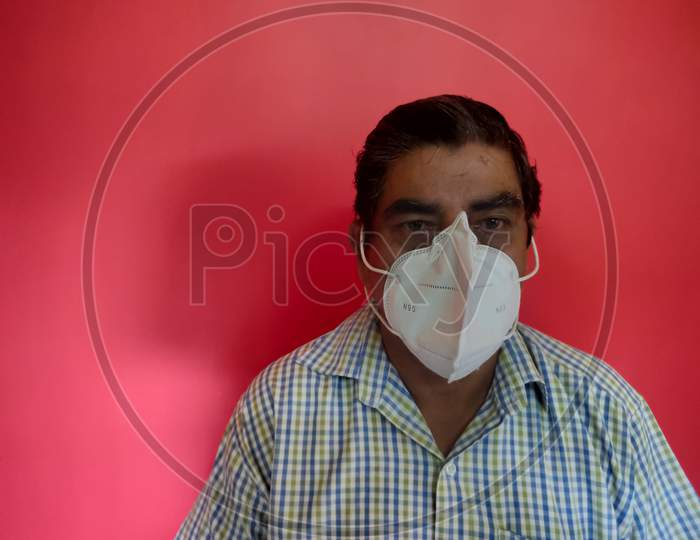 A Old Man Wearing Face Mask For Corona Virus Protection (Covid-19)