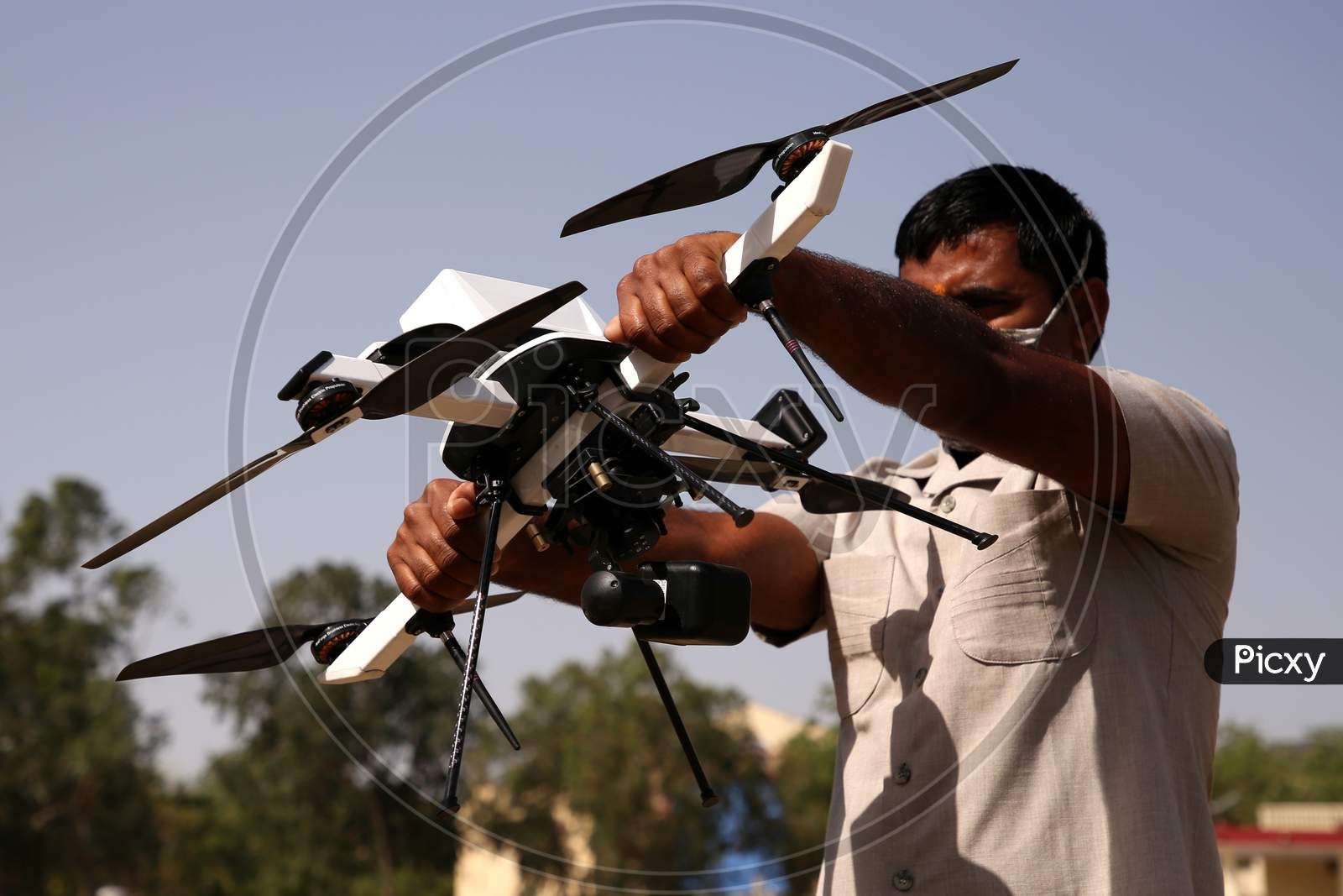 A Police Personnel Prepares To Check A Drone For Surveilling A Hotspot Area During A Government-Imposed Nationwide Lockdown As A Preventive Measure Against The Covid-19 Coronavirus, In Ajmer, Rajasthan, India On 02 May 2020.