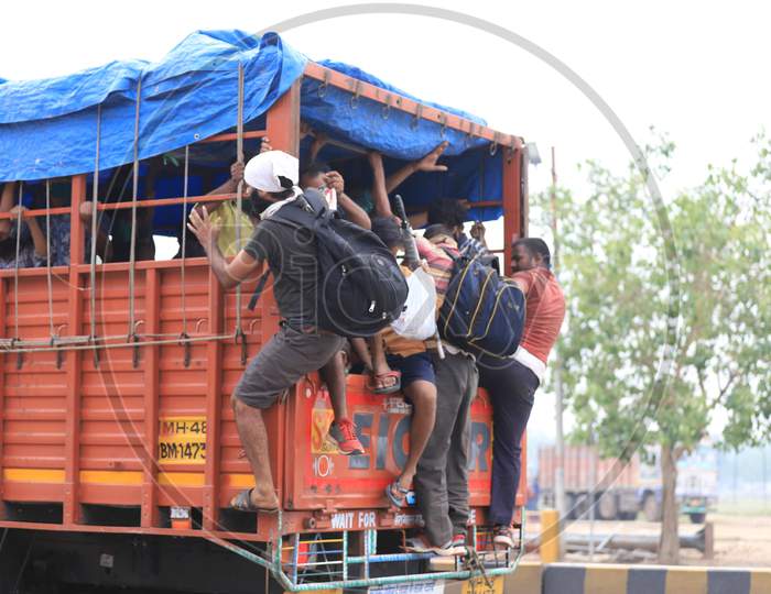 Migrant Workers Who Arrived From Mumbai Board A Truck To Reach Their Native Places During Nationwide Lockdown Amidst Coronavirus Or COVID-19 Pandemic  In Prayagraj, May 12, 2020