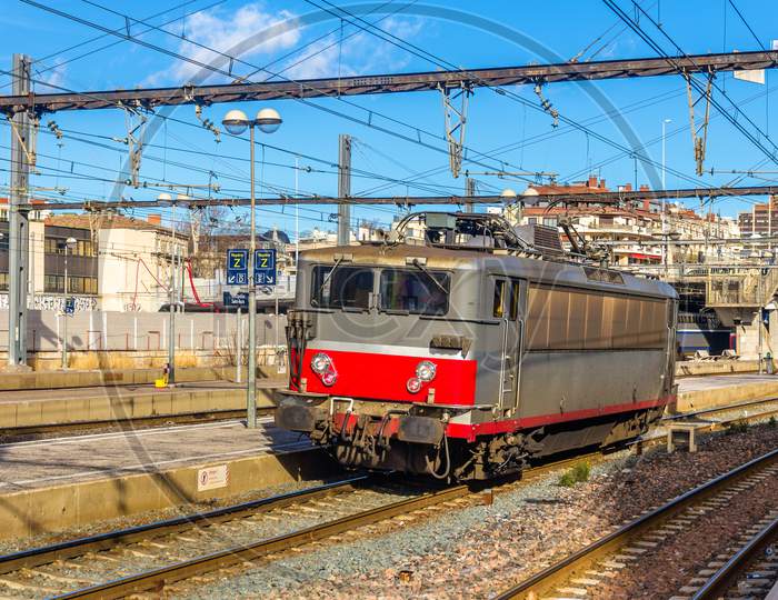 Electric Locomotive Passing The Montpellier Station - France