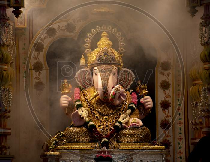 Dagdusheth Ganapati Idol At Pune With Golden Jewellery In The Aarti Time With Smoke And Beautiful Decoration In 2019